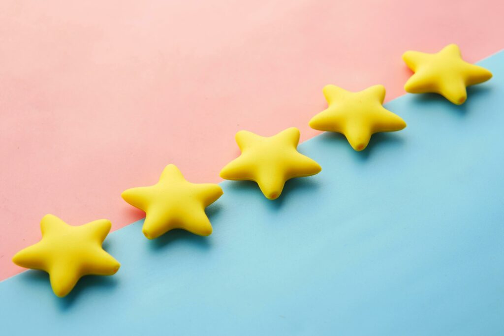 yellow stars on a blue and pink surface