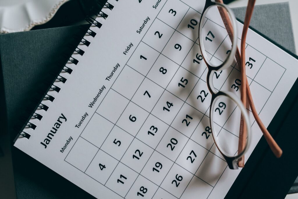 a calendar with glasses on it