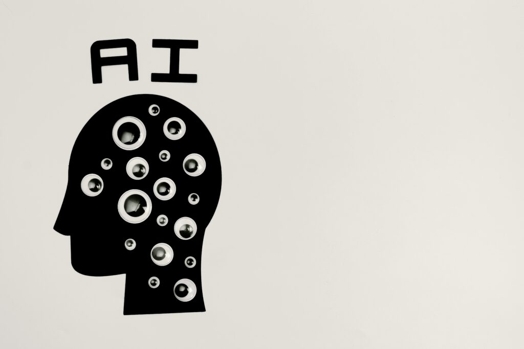 a black and white image of a head with many eyes ai