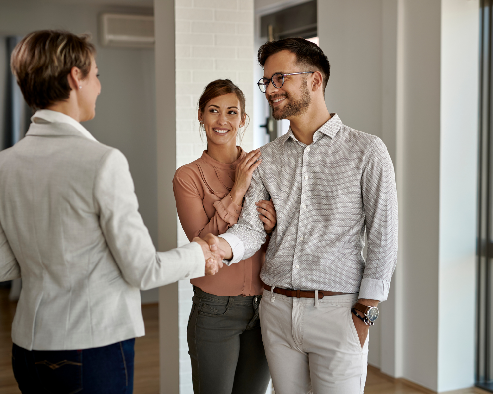 a man and woman shaking hands